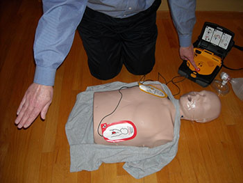 CPR dummy with AED patches